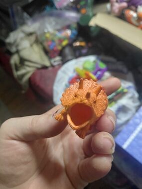 triceratops dinosaur figure, 2009 plastic orange